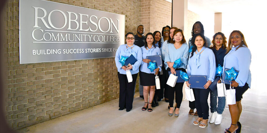 Robeson Community College ESL students proudly display their completion certificates from the Northstar Digital Literacy Program.