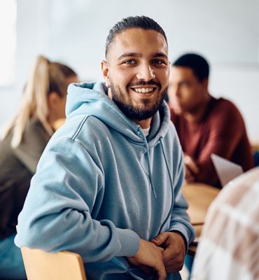 Students in the classroom preparing to take a test.